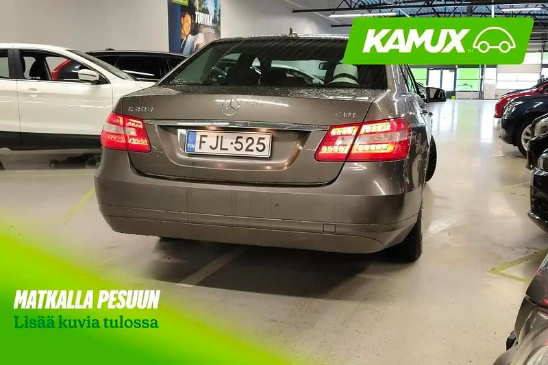 Käytetty Mercedes E200 Business 136 HP (100 kW) 2010 Hopea / harmaa Sedan
