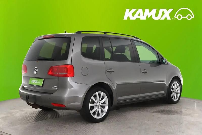Käytetty VW Touran Comfortline 105 HP (77 kW) 2011 Hopea / harmaa Tila-auto