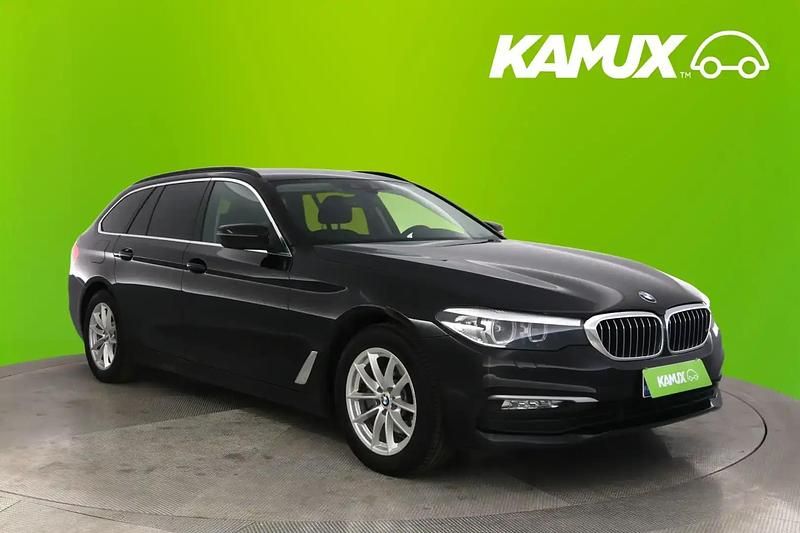 Musta Käytetty 2017 BMW 520 Farmari | 21 390 € (Perustarjous) - Kuva 1/4