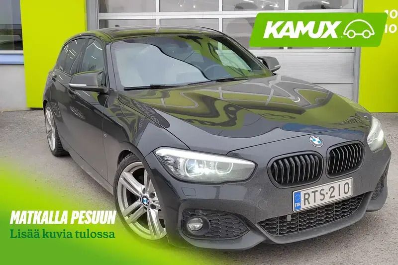 Musta Käytetty 2018 BMW 120 M Sport Viistoperä | 20 900 € - Kuva 1/4