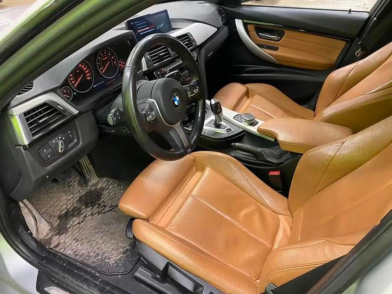 Käytetty BMW 330e Exclusive 252 HP (185 kW) 2018 Hopea / harmaa Sedan