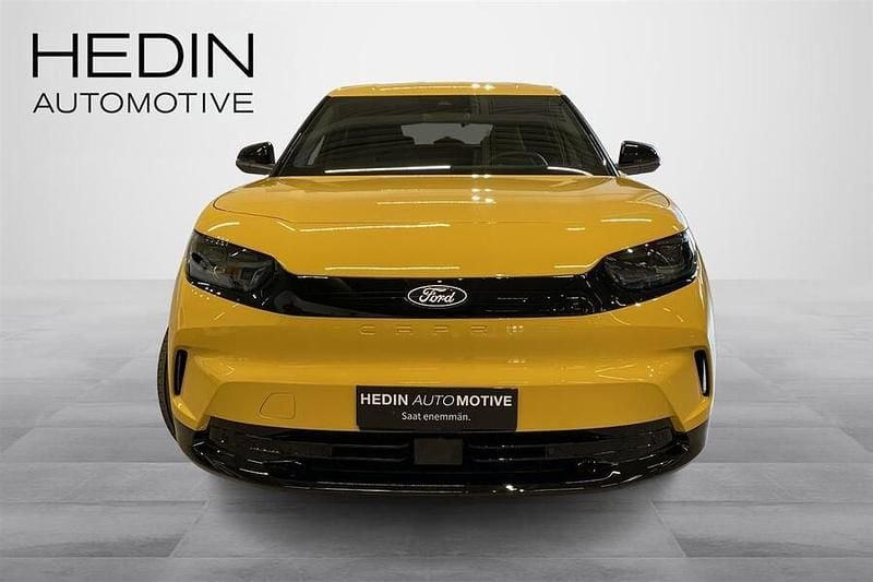 Käytetty Ford Capri Extended Range 210 kW (286 HP) 2025 Keltainen Katumaasturi