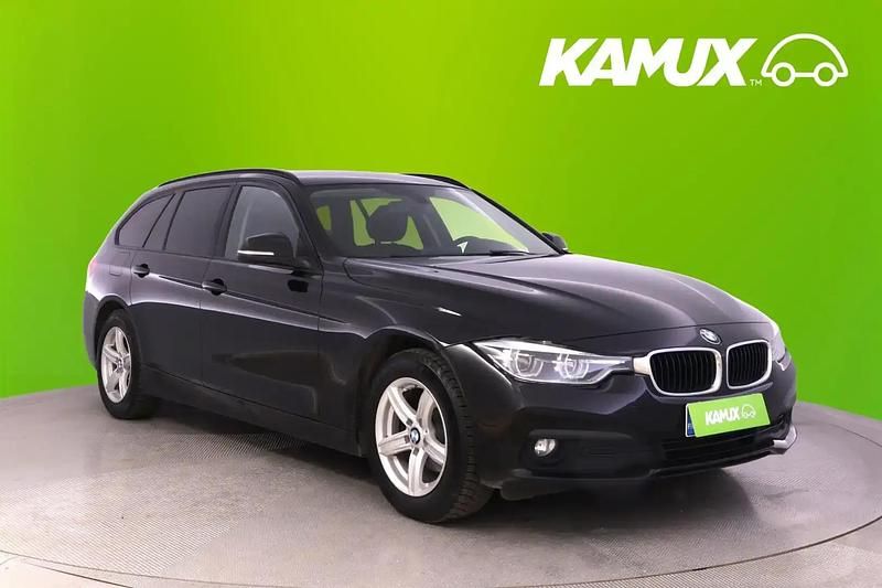Musta Käytetty 2017 BMW 318 Farmari | 15 980 € (Hieman kallis) - Kuva 1/4
