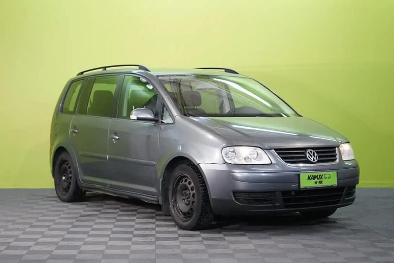 Käytetty VW Touran Trendline 116 HP (85 kW) 2004 Hopea / harmaa Tila-auto