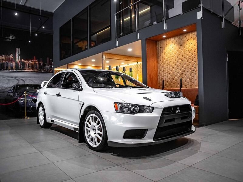 Valkoinen Käytetty 2009 Mitsubishi Lancer Sedan | 47 900 € - Kuva 1/4