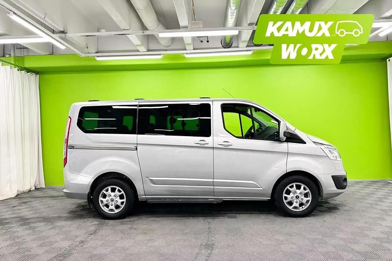 Käytetty Ford Tourneo Titanium 125 HP (91 kW) 2014 Hopea / harmaa Tila-auto