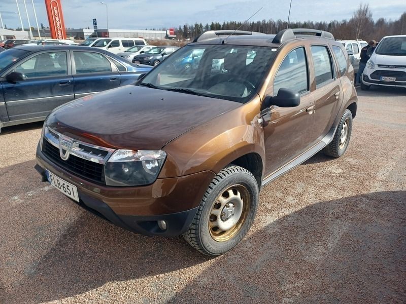 Ruskea Käytetty 2013 Dacia Duster Lauréate Katumaasturi | 8 490 € (Kallis) - Kuva 1/3