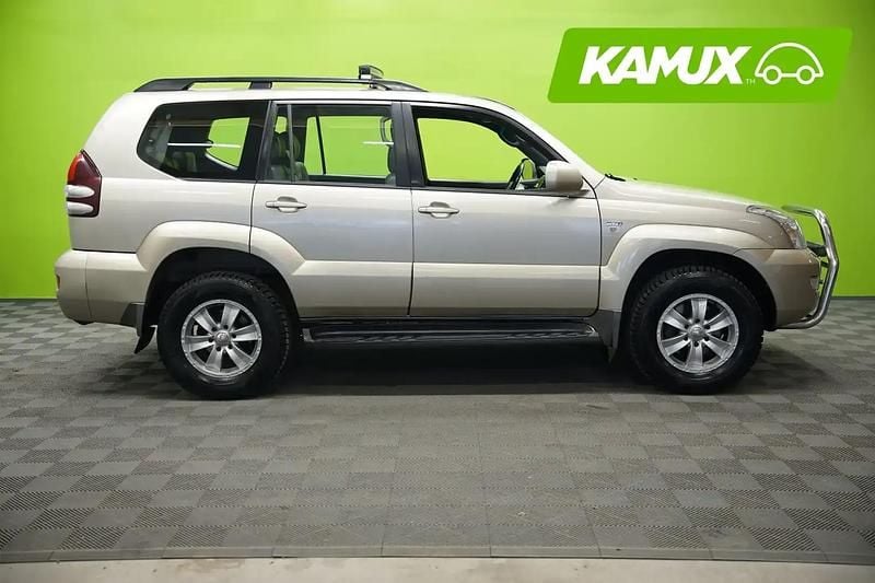 Käytetty Toyota Land Cruiser Executive 163 HP (119 kW) 2004 Keltainen / beige Tila-auto