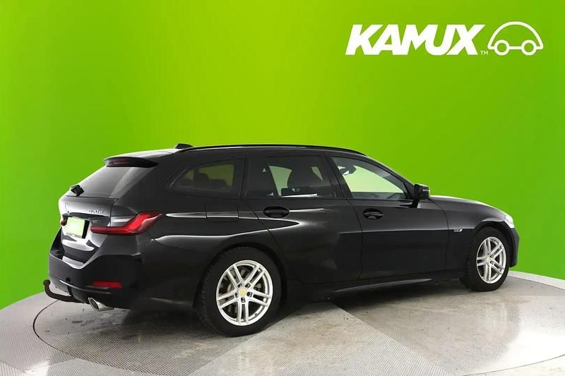 Käytetty BMW 330e 292 HP (214 kW) 2023 Musta Farmari
