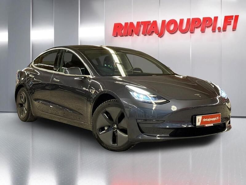 Harmaa Käytetty 2019 Tesla Model 3 Standard Range Sedan | 23 900 € (Perustarjous) - Kuva 1/3