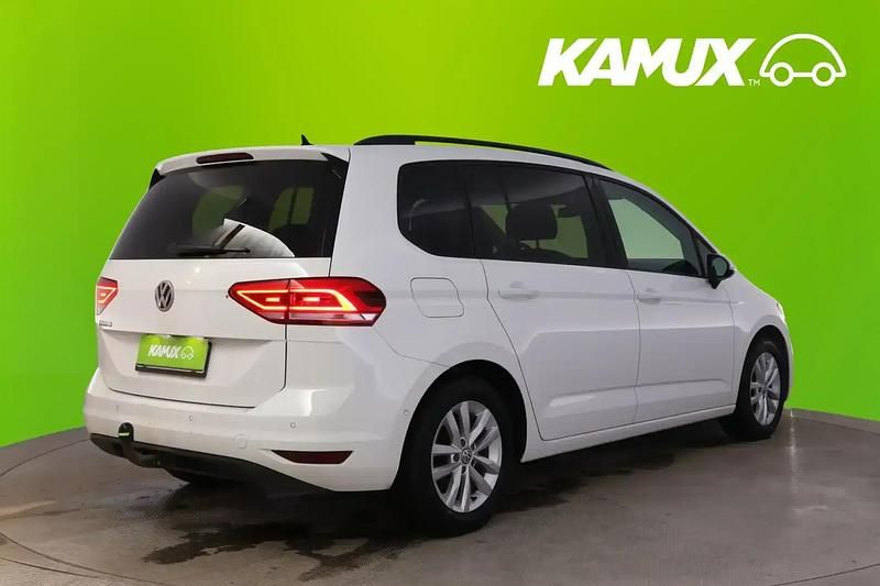 Käytetty VW Touran Comfortline 116 HP (85 kW) 2018 Valkoinen Tila-auto
