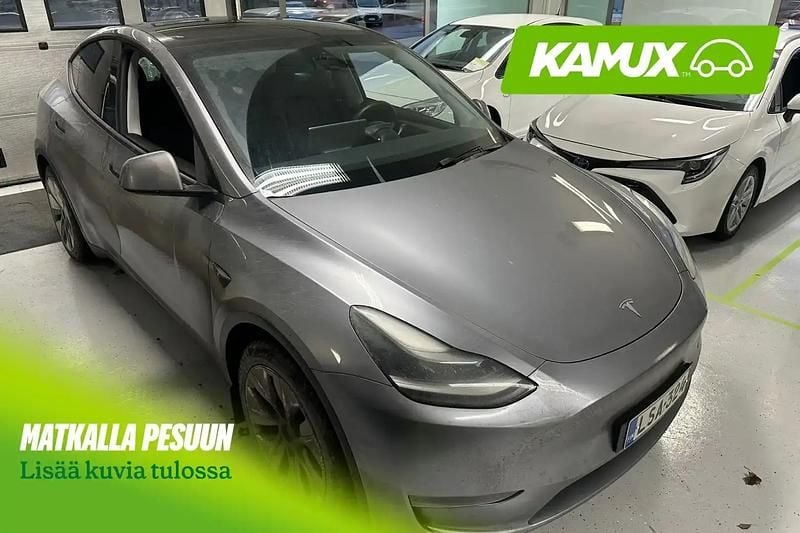 Hopea / harmaa Käytetty 2023 Tesla Model Y Long Range AWD Katumaasturi | 31 900 € (Hyvä tarjous) - Kuva 1/4