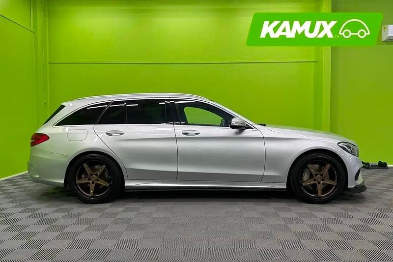 Käytetty Mercedes C250 AMG line 204 HP (150 kW) 2015 Hopea / harmaa Farmari