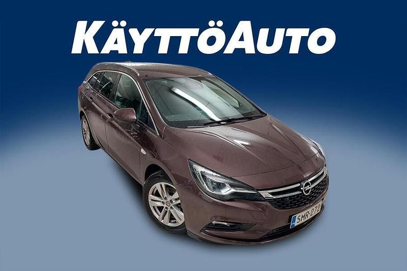 Met. ruskea (beige) Käytetty 2017 Opel Astra Innovation Farmari | 16 900 € (Hieman kallis) - Kuva 1/4