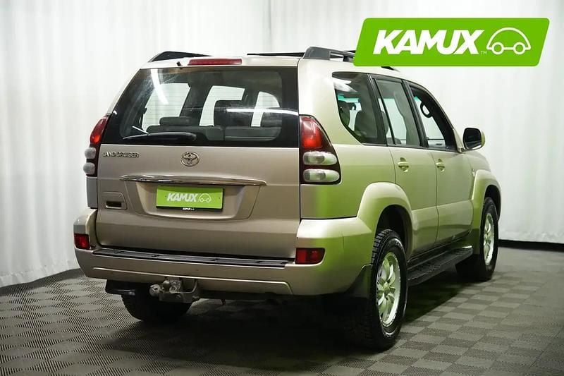 Käytetty Toyota Land Cruiser Executive 163 HP (119 kW) 2004 Keltainen / beige Tila-auto