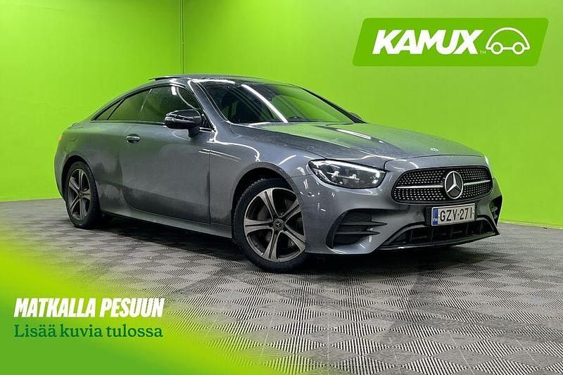 Hopea / harmaa Käytetty 2021 Mercedes E220 AMG Coupe - kaksiovinen | 46 700 € (Hieman kallis) - Kuva 1/3