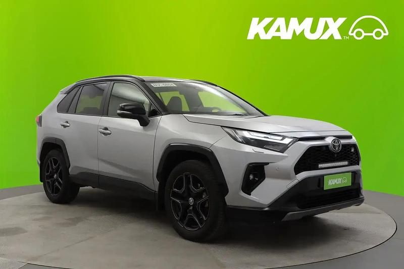 Hopea / harmaa Käytetty 2023 Toyota RAV4 Hybrid Sport Katumaasturi | 49 590 € (Perustarjous) - Kuva 1/4