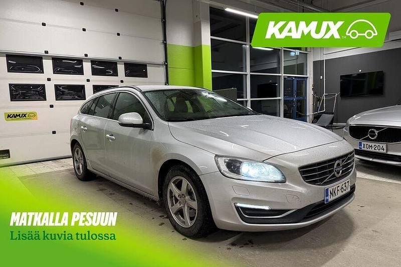 Hopea / harmaa Käytetty 2015 Volvo V60 Business Edition Farmari | 12 790 € (Hyvä tarjous) - Kuva 1/4