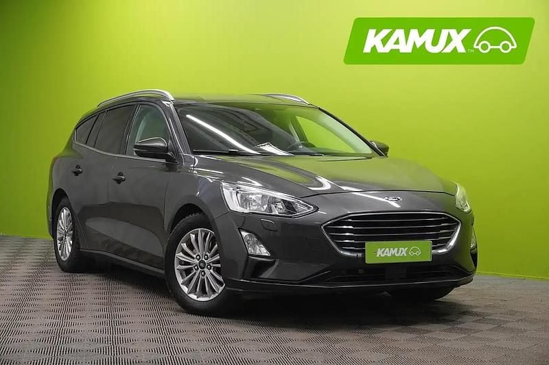 Käytetty Ford Focus Titanium 125 HP (91 kW) 2019 Hopea / harmaa Farmari