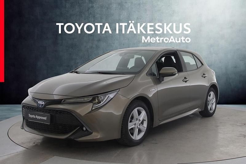 Ruskea (beige) Käytetty 2021 Toyota Corolla Active Viistoperä | 21 990 € (Perustarjous) - Kuva 1/4