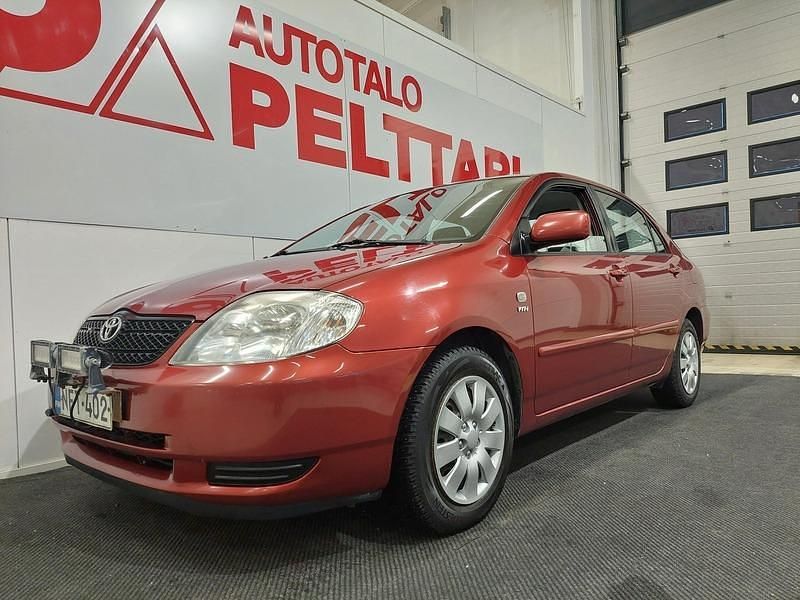 Punainen Käytetty 2004 Toyota Corolla Terra Sedan | 5 490 € - Kuva 1/4
