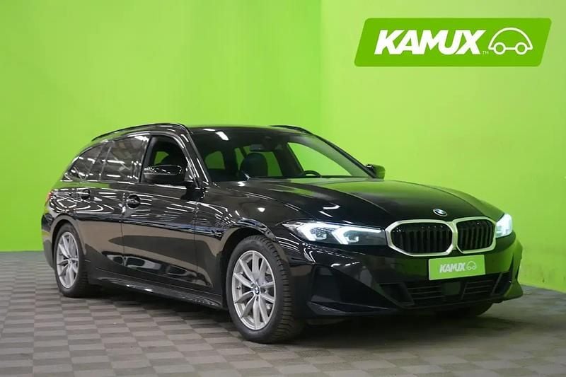 Musta Käytetty 2023 BMW 320e Shadowline Farmari | 28 490 € (Hieman kallis) - Kuva 1/4
