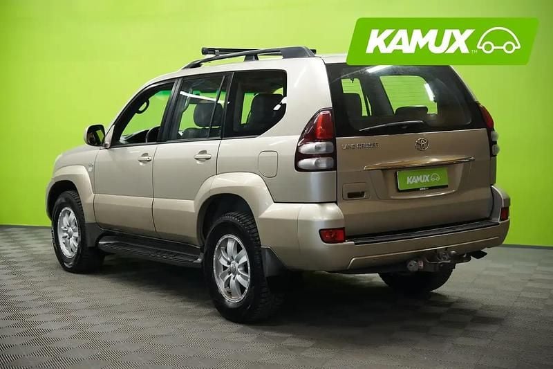 Käytetty Toyota Land Cruiser Executive 163 HP (119 kW) 2004 Keltainen / beige Tila-auto
