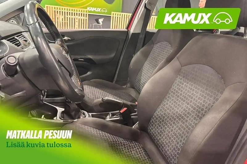 Käytetty Opel Corsa Enjoy 90 HP (66 kW) 2015 Punainen Viistoperä