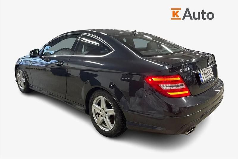 Käytetty Mercedes C180 AMG line 156 HP (114 kW) 2012 Musta Coupe - kaksiovinen