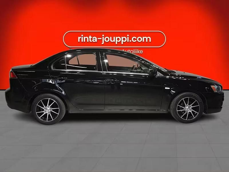 Käytetty Mitsubishi Lancer Invite 117 HP (86 kW) 2013 Musta Sedan