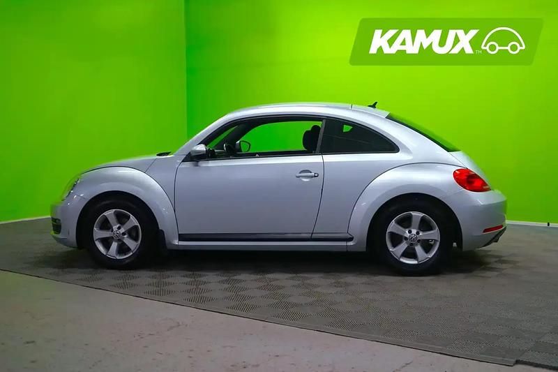 Käytetty VW Beetle 105 HP (77 kW) 2012 Hopea / harmaa Sedan