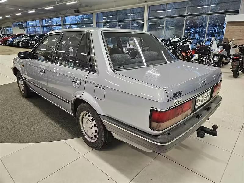 Käytetty Mazda 323 1989 Harmaa Sedan