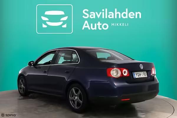 Käytetty VW Touran 143 HP (105 kW) 2006 Harmaa Tila-auto