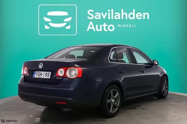 Käytetty VW Touran 143 HP (105 kW) 2006 Harmaa Tila-auto