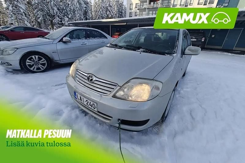 Käytetty Toyota Corolla 110 HP (80 kW) 2004 Hopea / harmaa Sedan