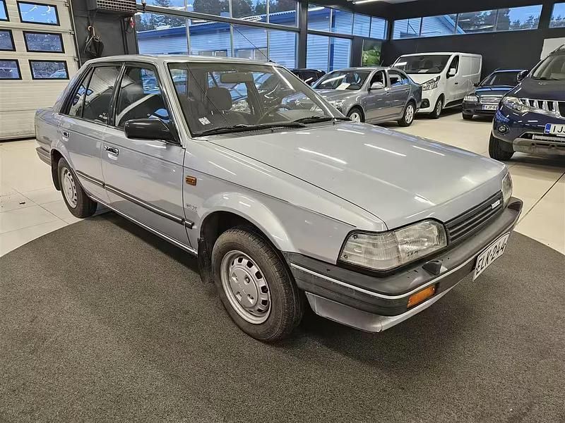 Käytetty Mazda 323 1989 Harmaa Sedan