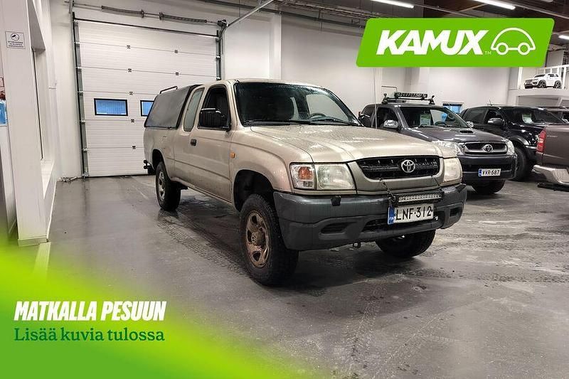 Keltainen / beige Käytetty 2003 Toyota HiLux Nouto | 8 900 € (Perustarjous) - Kuva 1/3