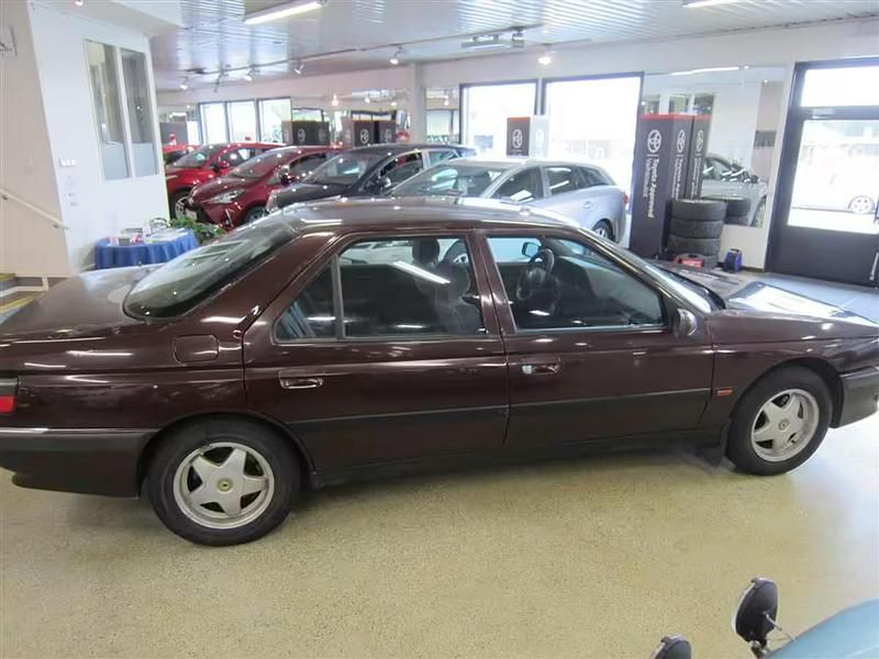 Käytetty Peugeot 605 132 HP (97 kW) 1998 Met. punainen Sedan