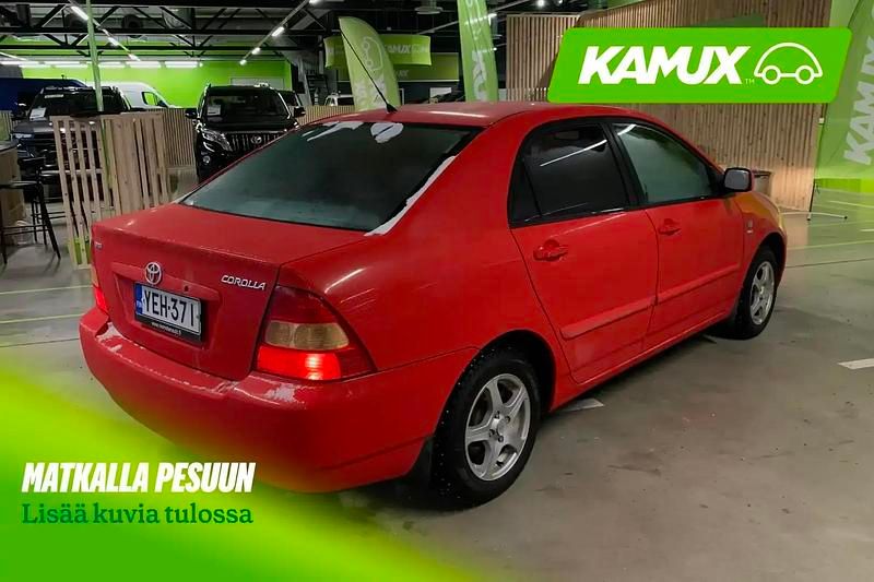 Käytetty Toyota Corolla 97 HP (71 kW) 2002 Punainen Sedan