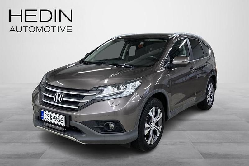 Ruskea Käytetty 2013 Honda CR-V Lifestyle Katumaasturi | 12 890 € (Perustarjous) - Kuva 1/4