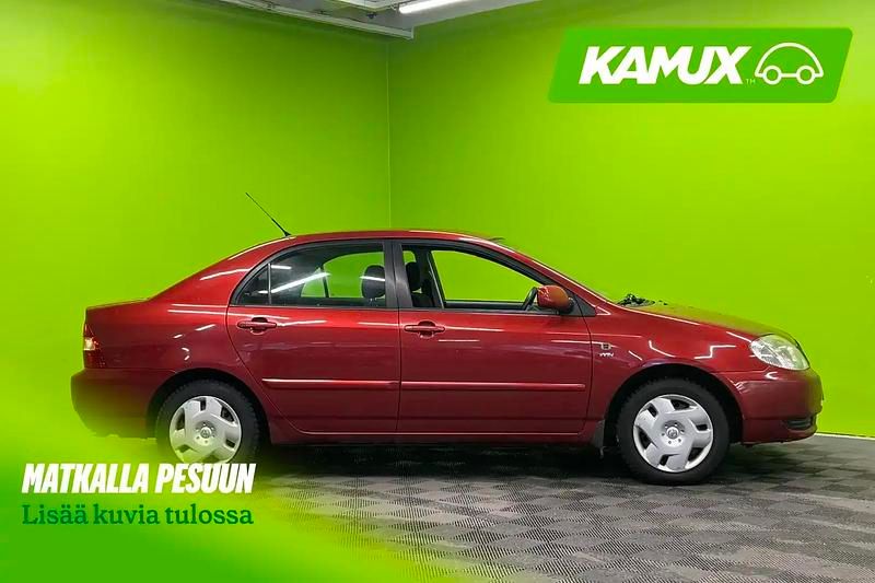 Käytetty Toyota Corolla Terra 110 HP (80 kW) 2002 Punainen Sedan