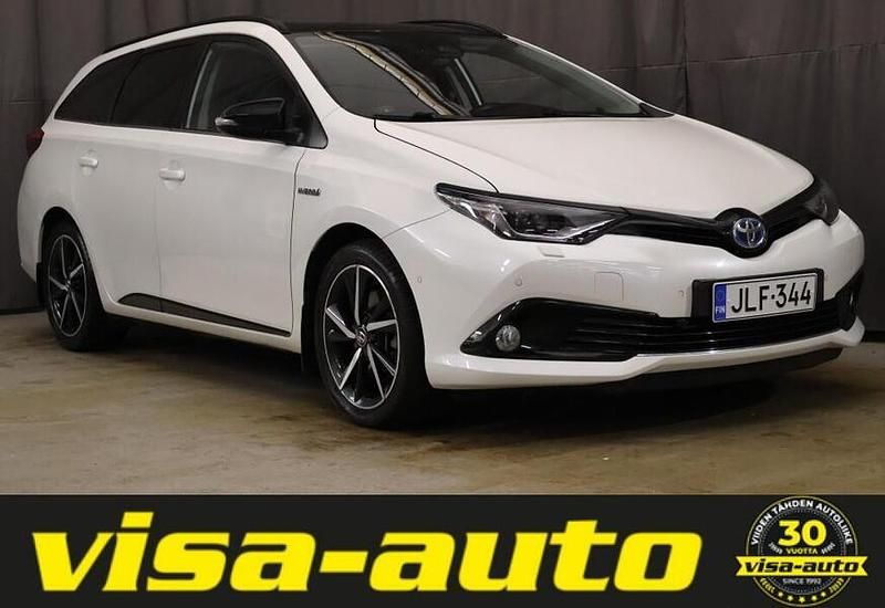 Valkoinen Käytetty 2018 Toyota Auris Hybrid Edition Farmari | 15 490 € (Hieman kallis) - Kuva 1/4