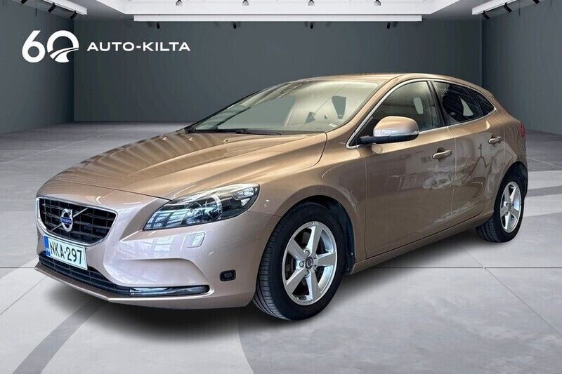 Ruskea (beige) Käytetty 2016 Volvo V40 Business Edition Farmari | 18 900 € (Perustarjous) - Kuva 1/4