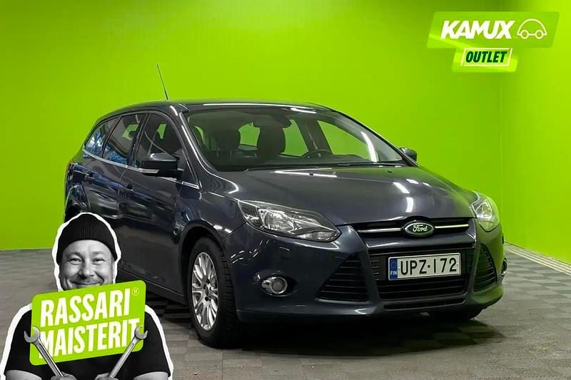 Hopea / harmaa Käytetty 2012 Ford Focus Titanium Farmari | 3 490 € (Hyvä tarjous) - Kuva 1/4