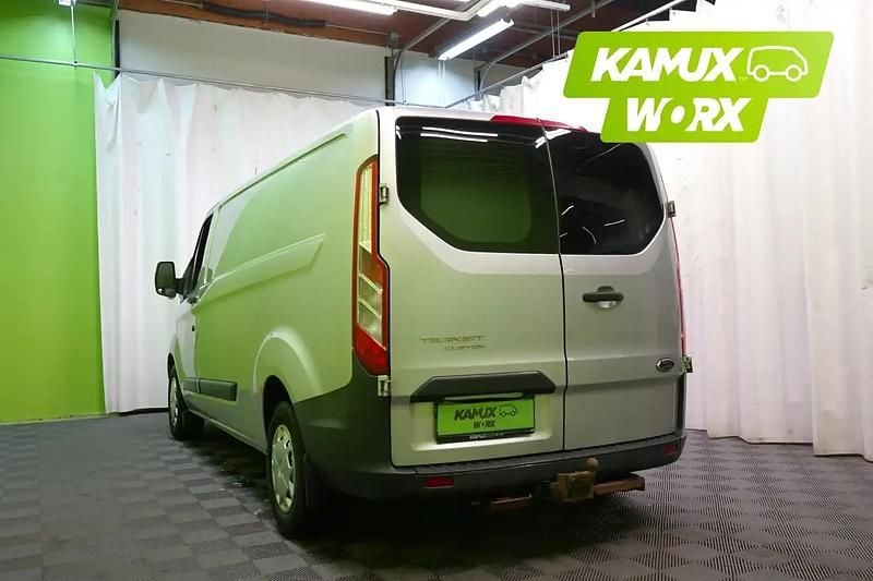 Käytetty Ford Transit Custom 125 HP (91 kW) 2016 Hopea / harmaa Sedan