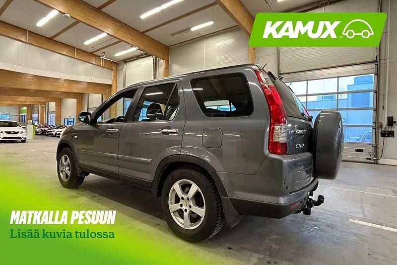Käytetty Honda CR-V ES 150 HP (110 kW) 2006 Hopea / harmaa Katumaasturi