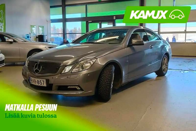 Käytetty Mercedes E250 184 HP (135 kW) 2011 Hopea / harmaa Coupe - kaksiovinen