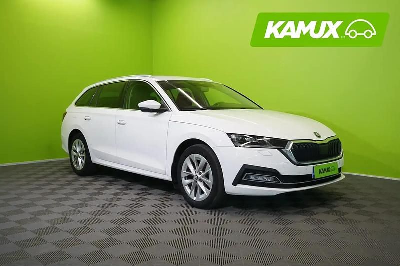 Valkoinen Käytetty 2023 Skoda Octavia Style Farmari | 31 880 € (Kallis) - Kuva 1/4