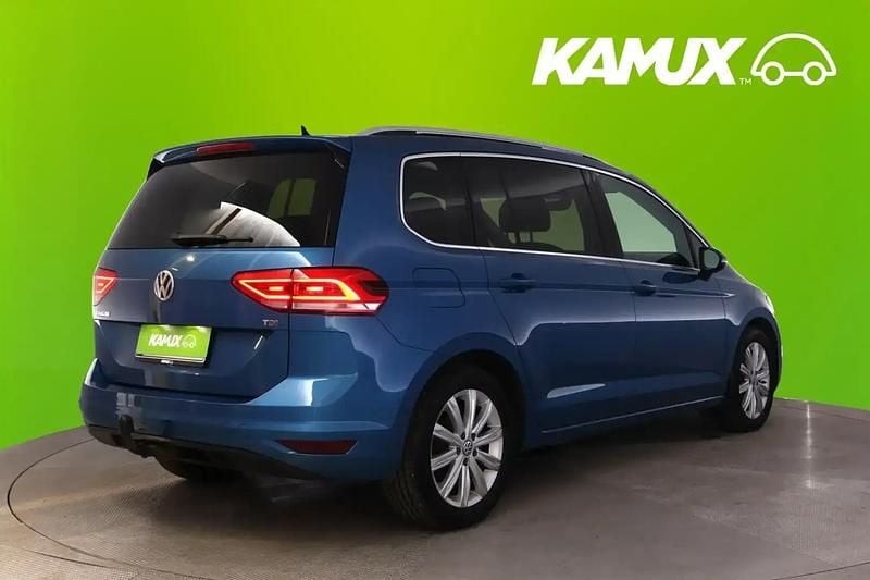 Käytetty VW Touran Highline 116 HP (85 kW) 2017 Sininen Tila-auto
