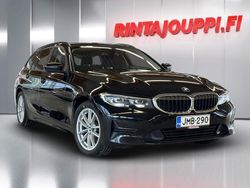 Musta Käytetty 2021 BMW 320e Farmari | 21 600 € (Perustarjous)